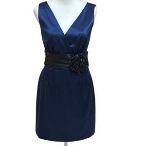 Eliza J minidress. Blue with black waist and bow detail. Size 4.